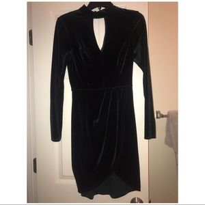 Emerald green velvet dress